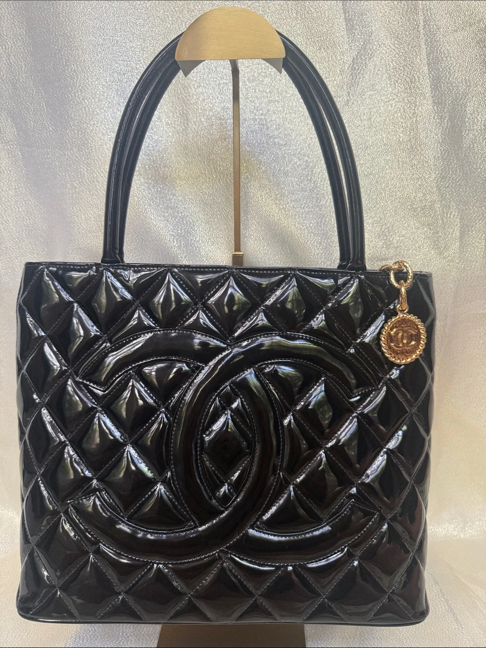 CHANEL Black Quilted Patent Leather Medallion Tote with Gold CC Medallion Charm
